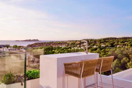 Stunning new Ibiza-style villa with sea views just a short stroll from the beach of Cala Tarida