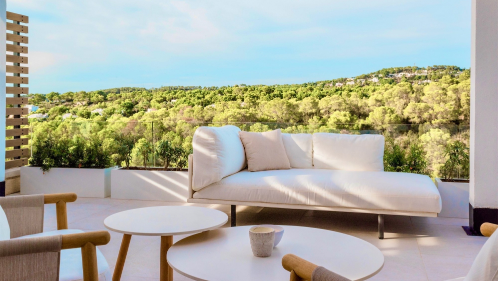 Stunning new Ibiza-style villa with sea views just a short stroll from the beach of Cala Tarida