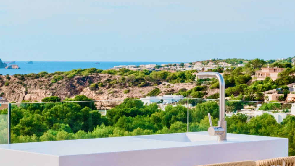 Stunning new Ibiza-style villa with sea views just a short stroll from the beach of Cala Tarida